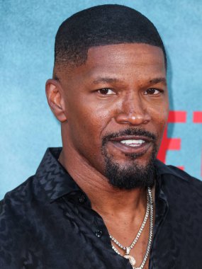 Amerikalı aktör Jamie Foxx Netflix 'in' Day Vardiyası 'nın dünya prömiyerine 10 Ağustos 2022' de Los Angeles, Kaliforniya 'da bulunan Regal Cinemas LA Live Stadyumu' nda geldi.. 