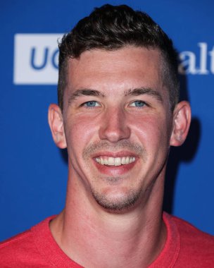 Major League Baseball Walker Buehler 'ın Los Angeles Dodgers takımının Amerikan profesyonel beyzbol atıcısı 8 Ağustos 2022' de Elysian Park, Los Angeles, Kaliforniya 'daki Dodger Stadyumu' nda düzenlenen Kershaw 's Challenge Ping Pong 4 Amaç 2022' ye ulaştı.