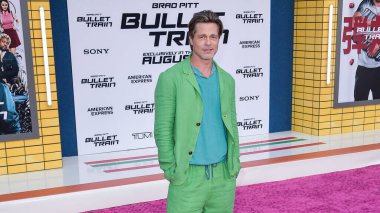 American actor Brad Pitt wearing a custom Haans Nicholas Mott look with adidas x Gucci Gazelle shoes arrives at the Premiere Of Sony Pictures' 'Bullet Train' held at the Regency Village Theatre on August 1, 2022 in Westwood, Los Angeles, California clipart