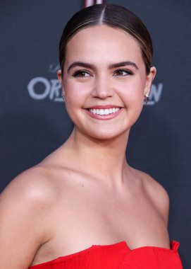 American actress Bailee Madison wearing a Toni Maticevski dress and Dolce and Gabbana shoes arrives at the Bloody Red Carpet And Exclusive Screening Of HBO Max's 'Pretty Little Liars: Original Sin' on July 15, 2022 in Burbank clipart