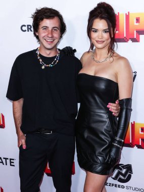 Australian actor Nicholas Coombe and American actress Paris Berelc arrive at the Los Angeles Premiere Of Lionsgate's '1Up' held at the TCL Chinese 6 Theatres on July 12, 2022 in Hollywood, Los Angeles, California, United States.  clipart
