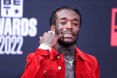 Lil Uzi Vert arrives at the BET Awards 2022 held at Microsoft Theater at L.A. Live on June 26, 2022 in Los Angeles, California, United States. clipart
