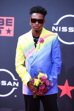Lucky Daye arrives at the BET Awards 2022 held at Microsoft Theater at L.A. Live on June 26, 2022 in Los Angeles, California, United States. 