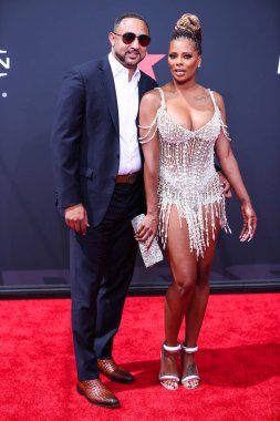 Michael Sterling ve Eva Marcille, 26 Haziran 2022 'de Los Angeles, Kaliforniya' da Microsoft Theater 'da düzenlenen BET Ödülleri' ne geldiler.. 