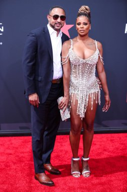 Michael Sterling ve Eva Marcille, 26 Haziran 2022 'de Los Angeles, Kaliforniya' da Microsoft Theater 'da düzenlenen BET Ödülleri' ne geldiler.. 