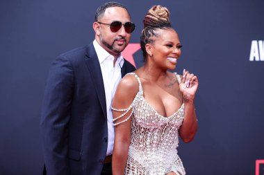 Michael Sterling ve Eva Marcille, 26 Haziran 2022 'de Los Angeles, Kaliforniya' da Microsoft Theater 'da düzenlenen BET Ödülleri' ne geldiler.. 