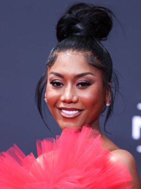 Muni Long arrives at the BET Awards 2022 held at Microsoft Theater at L.A. Live on June 26, 2022 in Los Angeles, California, United States.