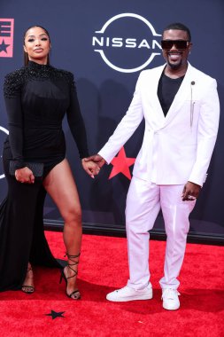 Prenses Love ve kocası Ray J, 26 Haziran 2022 'de Los Angeles, Kaliforniya' da Microsoft Theater 'da düzenlenen BET Ödülleri' ne geldiler.. 