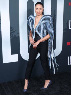 Amerikalı aktris Jurnee Smollett Ronald Van Der Kemp kılığında Le Silla topuklu ve Yeprem küpeli olarak Netflix 'in 15 Eylül 2022' de Netflix Tudum Tiyatrosu 'nda düzenlenen' Lou 'filminin Los Angeles galasına geldi..