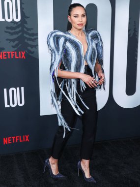 Amerikalı aktris Jurnee Smollett Ronald Van Der Kemp kılığında Le Silla topuklu ve Yeprem küpeli olarak Netflix 'in 15 Eylül 2022' de Netflix Tudum Tiyatrosu 'nda düzenlenen' Lou 'filminin Los Angeles galasına geldi..