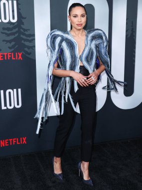 Amerikalı aktris Jurnee Smollett Ronald Van Der Kemp kılığında Le Silla topuklu ve Yeprem küpeli olarak Netflix 'in 15 Eylül 2022' de Netflix Tudum Tiyatrosu 'nda düzenlenen' Lou 'filminin Los Angeles galasına geldi..