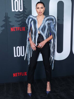 Amerikalı aktris Jurnee Smollett Ronald Van Der Kemp kılığında Le Silla topuklu ve Yeprem küpeli olarak Netflix 'in 15 Eylül 2022' de Netflix Tudum Tiyatrosu 'nda düzenlenen' Lou 'filminin Los Angeles galasına geldi..