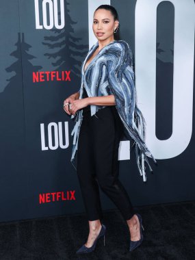 Amerikalı aktris Jurnee Smollett Ronald Van Der Kemp kılığında Le Silla topuklu ve Yeprem küpeli olarak Netflix 'in 15 Eylül 2022' de Netflix Tudum Tiyatrosu 'nda düzenlenen' Lou 'filminin Los Angeles galasına geldi..