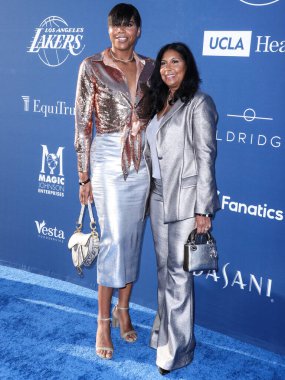 Amerikan televizyon karakteri EJ Johnson ve annesi / Magic Johnson 'ın eşi Cookie Johnson, Los Angeles Dodgers Vakfı' na (LADF) 16 Haziran 2022 tarihinde Dodger Stadyumu 'nda düzenlenen yıllık Mavi Elmas Galası' na geldiler.. 