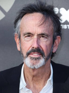 Film yapımcısı Patrick Crowley, 11 Haziran 2022 'de Universal Stüdyoları Backlot' ta düzenlenen Charlize Theron Africa Yardım Projesine (CTAOP) ulaştı..