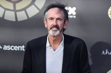 Film yapımcısı Patrick Crowley, 11 Haziran 2022 'de Universal Stüdyoları Backlot' ta düzenlenen Charlize Theron Africa Yardım Projesine (CTAOP) ulaştı..