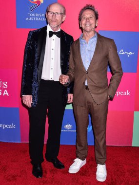 Amerikalı yönetmen Ron Howard ve Amerikalı film yapımcısı Brian Grazer, 11 Haziran 2022 'de Los Angeles LIVE' da düzenlenen G 'Day AAA (Amerikan Avustralya Birliği) Sanat Galası 2022' ye geldiler.. 