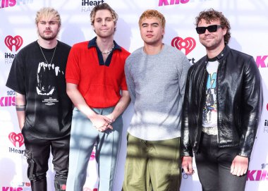 Michael Clifford, Ashton Irwin, Calum Hood ve Luke Hemmings (5SOS), 4 Haziran 2022 'de Carson, Los Angeles, Kaliforniya, ABD' de düzenlenen 2022 iHeartRadio Wango Tango 'ya katıldılar.. 