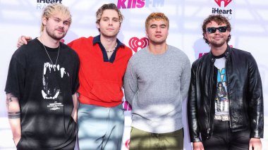 Michael Clifford, Ashton Irwin, Calum Hood ve Luke Hemmings (5SOS), 4 Haziran 2022 'de Carson, Los Angeles, Kaliforniya, ABD' de düzenlenen 2022 iHeartRadio Wango Tango 'ya katıldılar.. 