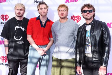 Michael Clifford, Ashton Irwin, Calum Hood ve Luke Hemmings (5SOS), 4 Haziran 2022 'de Carson, Los Angeles, Kaliforniya, ABD' de düzenlenen 2022 iHeartRadio Wango Tango 'ya katıldılar..