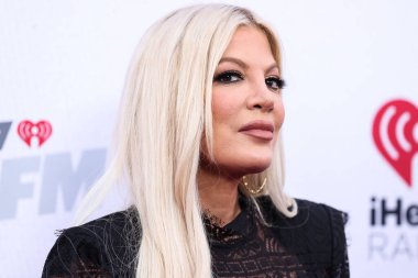 Amerikalı aktris Tori Spelling, 4 Haziran 2022 'de Carson, Los Angeles, Kaliforniya' da düzenlenen Wango Radyosu 2022 tarihli Onur Sağlık Spor Parkı 'na katılmaktadır..
