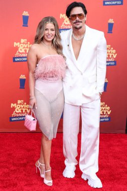 5 Haziran 'da yayınlanan bu resimde, Amerikalı aktris Ariana Madix ve aktör Tom Sandoval 2022 MTV Film ve TV Ödülleri' ne geldiler: Santa Monica, Los Angeles, Kaliforniya 'daki The Barker Hangar' da UNSCRIPTED düzenlendi.. 