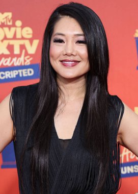 5 Haziran 'da yayınlanan bu resimde, Görsel Sanatçı Crystal Kung Minkoff 2022 MTV Film ve TV Ödülleri' ne ulaştı: Santa Monica, Los Angeles, Kaliforniya, ABD 'deki Barker Hangar' da UNSCRIPTED. 