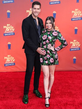 5 Haziran 'da yayınlanan bu resimde Dom Fenison ve kız arkadaşı / Amerikan TV kişiliği / rapçi Chanel West Coast 2022 MTV Film ve TV Ödülleri' ne geldiler: UNSCRIPTED Santa Monica, Los Angeles, Kaliforniya, ABD 'deki Barker Hangar' da düzenlendi.. 