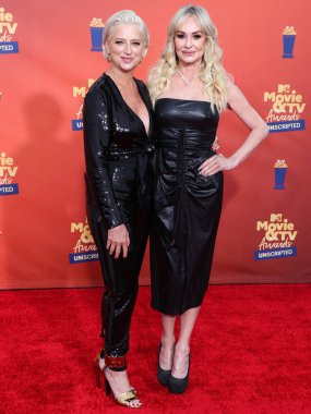 5 Haziran 'da yayınlanan bu resimde Dorinda Medley ve Taylor Armstrong 2022 MTV Film ve TV Ödülleri' ne geldiler: Santa Monica, Los Angeles, Kaliforniya, ABD 'deki Barker Hangar' da UNSCRIPTED. 