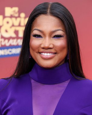 5 Haziran 'da yayınlanan bu resimde, Haitili-Amerikalı aktris Garcelle Beauvais 2022 MTV Film ve TV Ödülleri' ne ulaşır: Santa Monica, Los Angeles, Kaliforniya 'daki The Barker Hangar' da UNSCRIPTED. 