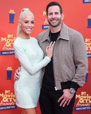 5 Haziran 'da yayınlanan bu resimde, Amerikalı aktris Heather Rae Young El Moussa ve koca / Amerikan TV kişiliği Tarek El Moussa 2022 MTV Film ve TV Ödülleri' ne geldiler: Los Angeles, Santa Monica 'daki Barker Hangarında UNSCRIPTED düzenlendi.
