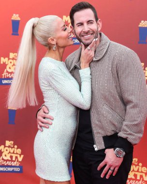 5 Haziran 'da yayınlanan bu resimde, Amerikalı aktris Heather Rae Young El Moussa ve koca / Amerikan TV kişiliği Tarek El Moussa 2022 MTV Film ve TV Ödülleri' ne geldiler: Los Angeles, Santa Monica 'daki Barker Hangarında UNSCRIPTED düzenlendi.