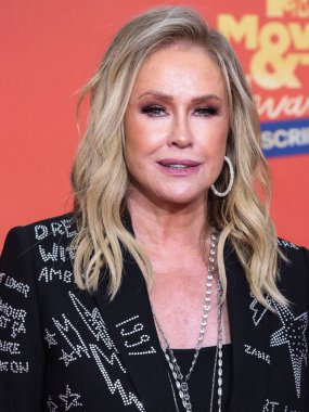 5 Haziran 'da yayınlanan bu resimde, Amerikalı moda tasarımcısı Kathy Hilton 2022 MTV Film ve TV Ödülleri' ne ulaştı: Santa Monica, Los Angeles, Kaliforniya, ABD 'deki Barker Hangar' da UNSCRIPTED. 