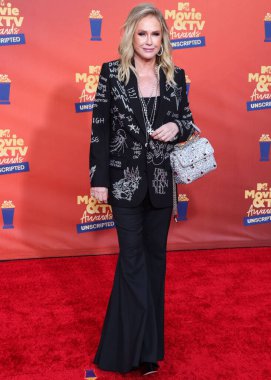 5 Haziran 'da yayınlanan bu resimde, Amerikalı moda tasarımcısı Kathy Hilton 2022 MTV Film ve TV Ödülleri' ne ulaştı: Santa Monica, Los Angeles, Kaliforniya, ABD 'deki Barker Hangar' da UNSCRIPTED. 