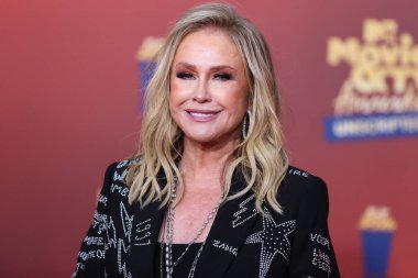 5 Haziran 'da yayınlanan bu resimde, Amerikalı moda tasarımcısı Kathy Hilton 2022 MTV Film ve TV Ödülleri' ne ulaştı: Santa Monica, Los Angeles, Kaliforniya, ABD 'deki Barker Hangar' da UNSCRIPTED. 
