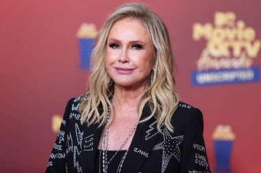 5 Haziran 'da yayınlanan bu resimde, Amerikalı moda tasarımcısı Kathy Hilton 2022 MTV Film ve TV Ödülleri' ne ulaştı: Santa Monica, Los Angeles, Kaliforniya, ABD 'deki Barker Hangar' da UNSCRIPTED. 