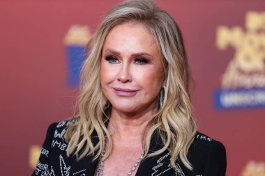 5 Haziran 'da yayınlanan bu resimde, Amerikalı moda tasarımcısı Kathy Hilton 2022 MTV Film ve TV Ödülleri' ne ulaştı: Santa Monica, Los Angeles, Kaliforniya, ABD 'deki Barker Hangar' da UNSCRIPTED. 