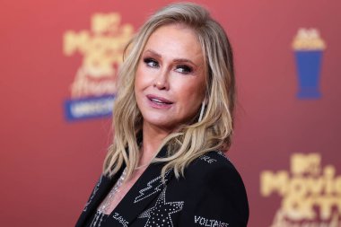 5 Haziran 'da yayınlanan bu resimde, Amerikalı moda tasarımcısı Kathy Hilton 2022 MTV Film ve TV Ödülleri' ne ulaştı: Santa Monica, Los Angeles, Kaliforniya, ABD 'deki Barker Hangar' da UNSCRIPTED.