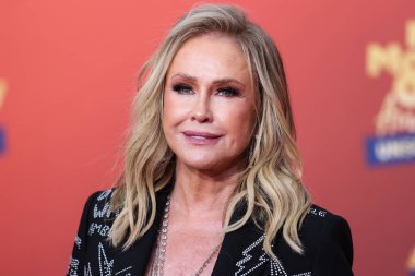5 Haziran 'da yayınlanan bu resimde, Amerikalı moda tasarımcısı Kathy Hilton 2022 MTV Film ve TV Ödülleri' ne ulaştı: Santa Monica, Los Angeles, Kaliforniya, ABD 'deki Barker Hangar' da UNSCRIPTED.