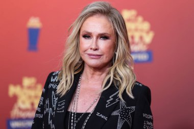 5 Haziran 'da yayınlanan bu resimde, Amerikalı moda tasarımcısı Kathy Hilton 2022 MTV Film ve TV Ödülleri' ne ulaştı: Santa Monica, Los Angeles, Kaliforniya, ABD 'deki Barker Hangar' da UNSCRIPTED. 