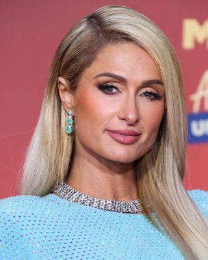 5 Haziran 'da yayınlanan bu resimde, Amerikan medya kişiliği Paris Hilton 2022 MTV Film ve TV Ödülleri' ne ulaştı: Santa Monica, Los Angeles, Kaliforniya, ABD 'deki Barker Hangar' da UNSCRIPTED. 