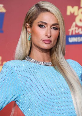 5 Haziran 'da yayınlanan bu resimde, Amerikan medya kişiliği Paris Hilton 2022 MTV Film ve TV Ödülleri' ne ulaştı: Santa Monica, Los Angeles, Kaliforniya, ABD 'deki Barker Hangar' da UNSCRIPTED. 