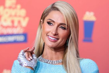 5 Haziran 'da yayınlanan bu resimde, Amerikan medya kişiliği Paris Hilton 2022 MTV Film ve TV Ödülleri' ne ulaştı: Santa Monica, Los Angeles, Kaliforniya, ABD 'deki Barker Hangar' da UNSCRIPTED. 