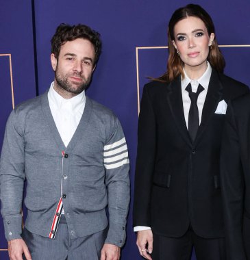 American singer Taylor Goldsmith and wife/American singer and actress Mandy Moore arrive at NBCUniversal's FYC House Closing Night Music Event held at the NBCU FYC House on May 25, 2022 in Hollywood, Los Angeles, California, United States.  clipart