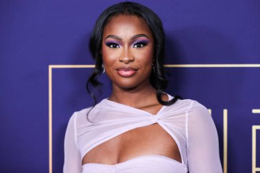 Amerikalı şarkıcı / aktris Coco Jones, NBCUniversal 'in' Bel-Air 'etkinliğine 24 Mayıs 2022' de Hollywood, Los Angeles, Kaliforniya, ABD 'deki NBCU FYC House' a geldi.. 
