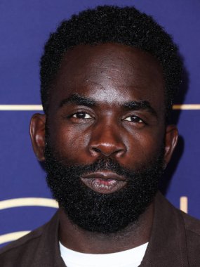 İngiliz televizyon oyuncusu Jimmy Akingbola, NBCUniversal 'in' Bel-Air 'etkinliğine 24 Mayıs 2022' de Hollywood, Los Angeles, Kaliforniya, ABD 'deki NBCU FYC House' a geldi.. 