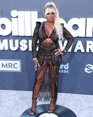 Julien Macdonald 'ı giyen Amerikalı şarkıcı / oyuncu Mary J. Blige, 15 Mayıs 2022' de ABD 'nin Las Vegas, Nevada kentindeki MGM Grand Garden Arena' da düzenlenen 2022 Billboard Müzik Ödüllerine ulaştı.. 