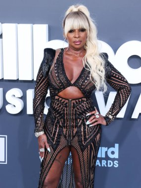 Julien Macdonald 'ı giyen Amerikalı şarkıcı / oyuncu Mary J. Blige, 15 Mayıs 2022' de ABD 'nin Las Vegas, Nevada kentindeki MGM Grand Garden Arena' da düzenlenen 2022 Billboard Müzik Ödüllerine ulaştı.. 