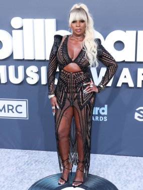 Julien Macdonald 'ı giyen Amerikalı şarkıcı / oyuncu Mary J. Blige, 15 Mayıs 2022' de ABD 'nin Las Vegas, Nevada kentindeki MGM Grand Garden Arena' da düzenlenen 2022 Billboard Müzik Ödüllerine ulaştı.. 