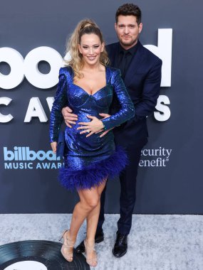 Michael Bubl (Michael Buble) ve Luisana Lopilato, 15 Mayıs 2022 'de MGM Grand Garden Arena' da düzenlenen 2022 Billboard Müzik Ödülleri 'ne geldiler.. 